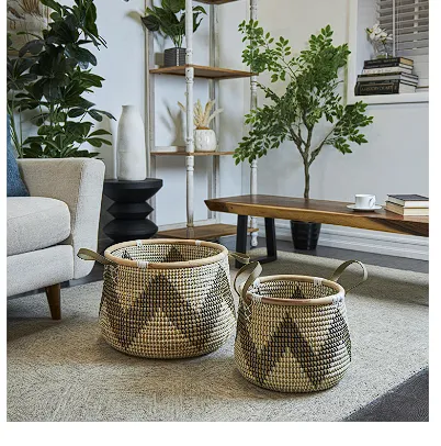 BROWN SEAGRASS HANDMADE ZIGZAG PATTERNED STORAGE BASKET WITH BLACK AND WHITE PLASTIC WEAVING AND LEATHER HANDLES